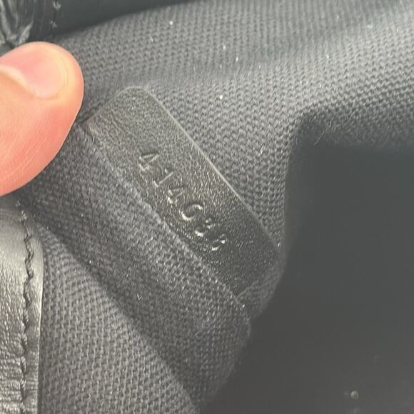 Alexander McQueen black calfskin leather grommet backpack - Picture 10 of 16